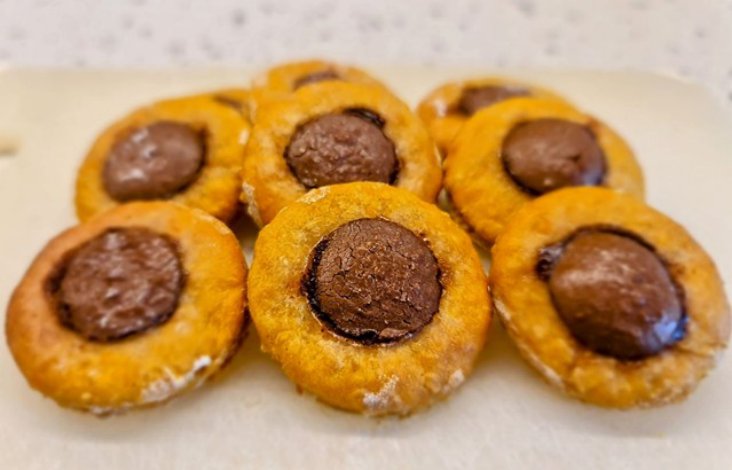 Peanut butter and pumpkin dog treats with carob buttons
