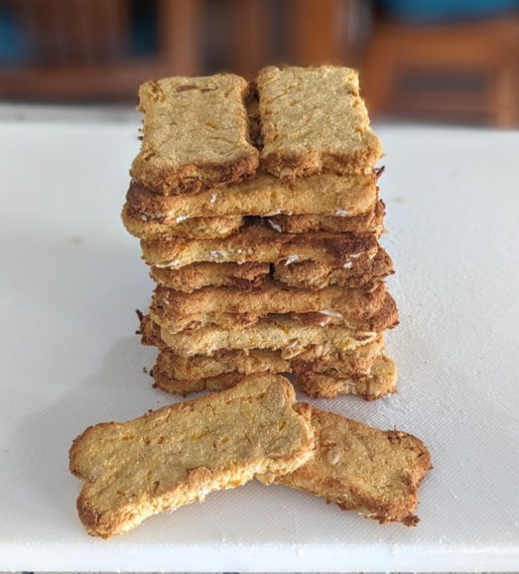 Bone-shaped apple and carrot dog biscuits