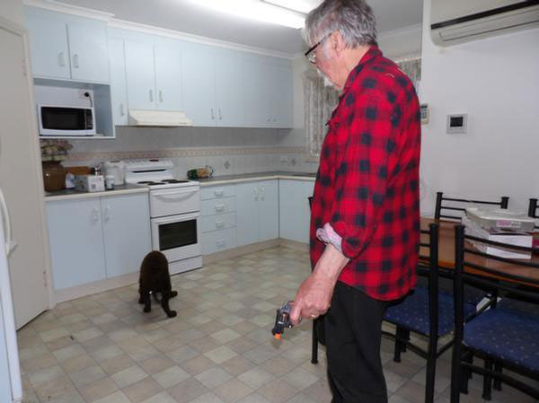Leon Wright indoors with his young Murray